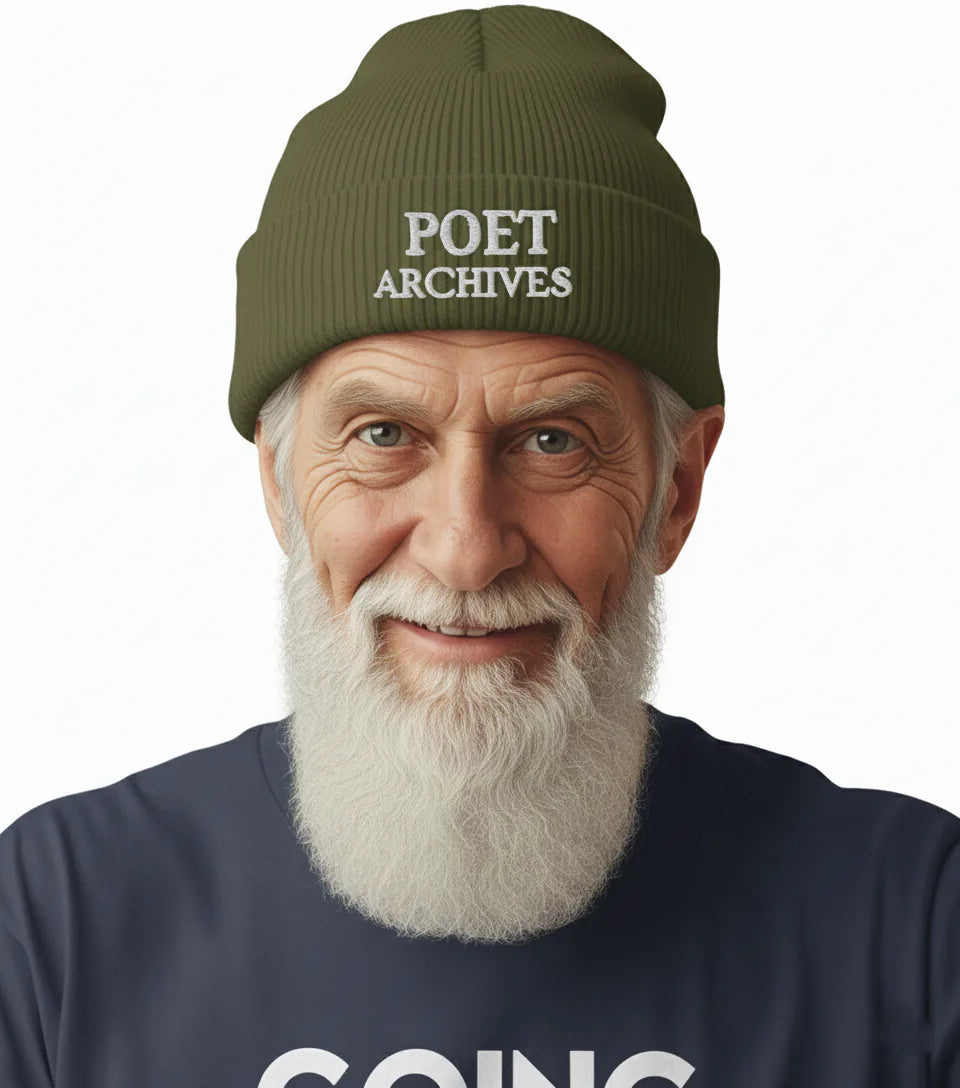 Man wearing a green beanie with 'POET ARCHIVES' text and a navy shirt with 'GOING' text on a white background