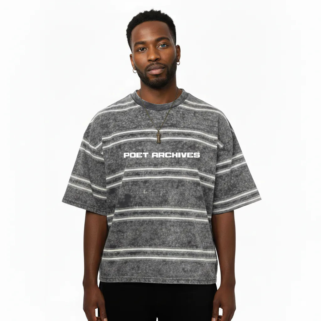 Man wearing a gray striped t-shirt with 'POET ARCHIVES' text on a white background