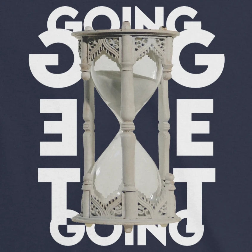 Close-up of the hourglass graphic and mirrored 'Going'/'Get'/'Going' typography printed on a navy t-shirt