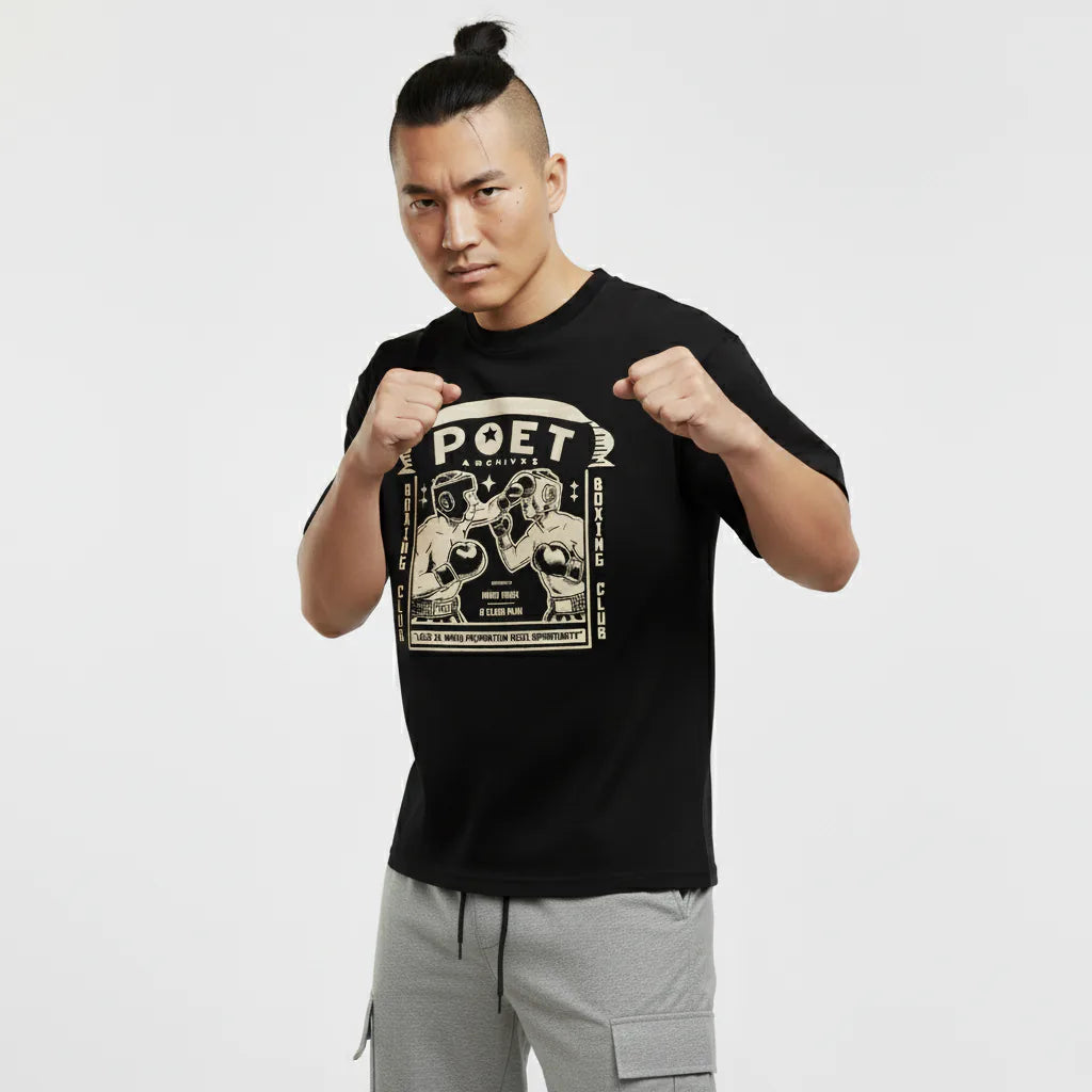 Person wearing a black t-shirt with 'POET' graphic design on a white background