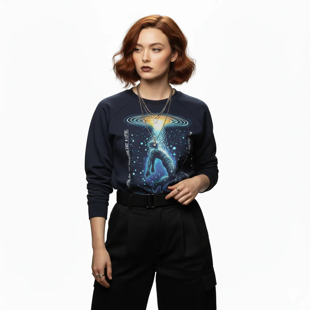 Person wearing a black sweatshirt with a graphic design on a white background