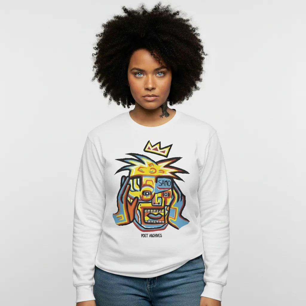 Person wearing a white sweatshirt with a colorful graphic design on a plain background