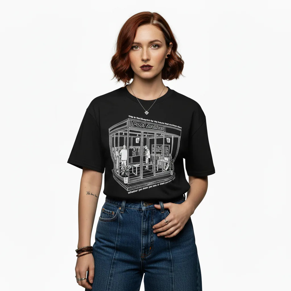 Person wearing a black t-shirt with a graphic design on a white background