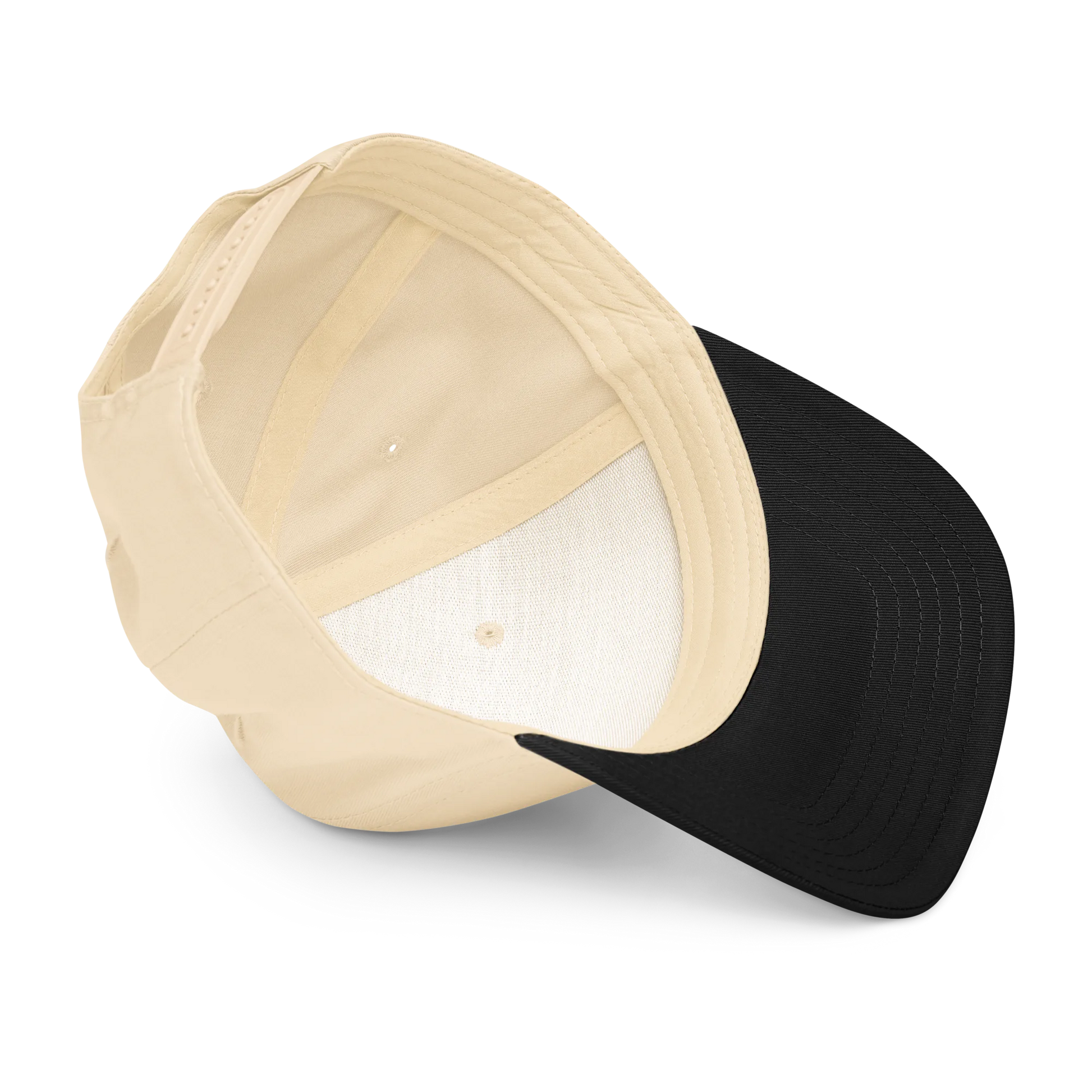 Two baseball caps, one beige and one black, on a white background