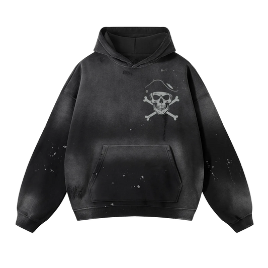 Black hoodie with skull and crossbones design on a white background