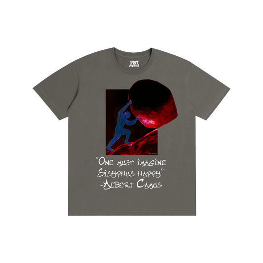 A dark gray crewneck t-shirt featuring a graphic print of a figure in blue climbing a rock with red highlights, accompanied by a white quote from Albert Camus on the front.