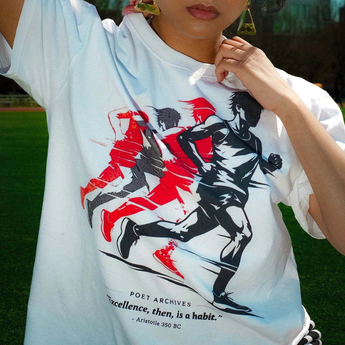Woman wearing a running tee that says excellence, then , is a habit, - Aristotle. Super motivational t-shirt THE BEST 