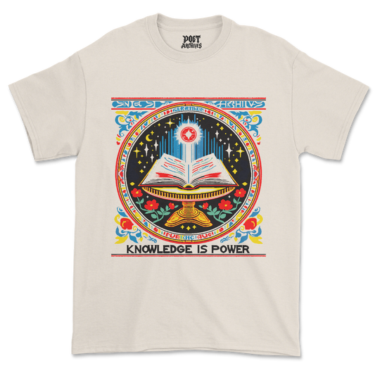 T-shirt laid flat, showing the Minecraft-inspired enchanting table illustration, from Poet Archives