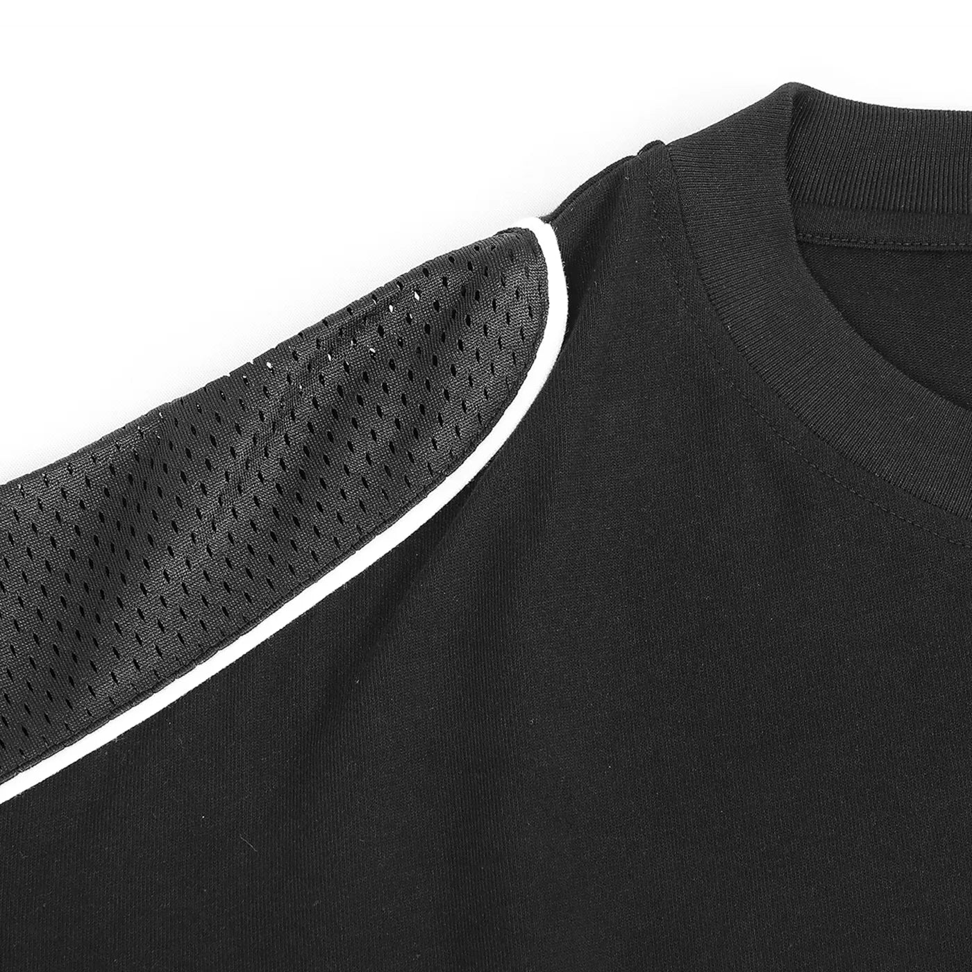 Black shirt with mesh sleeve detail on a white background