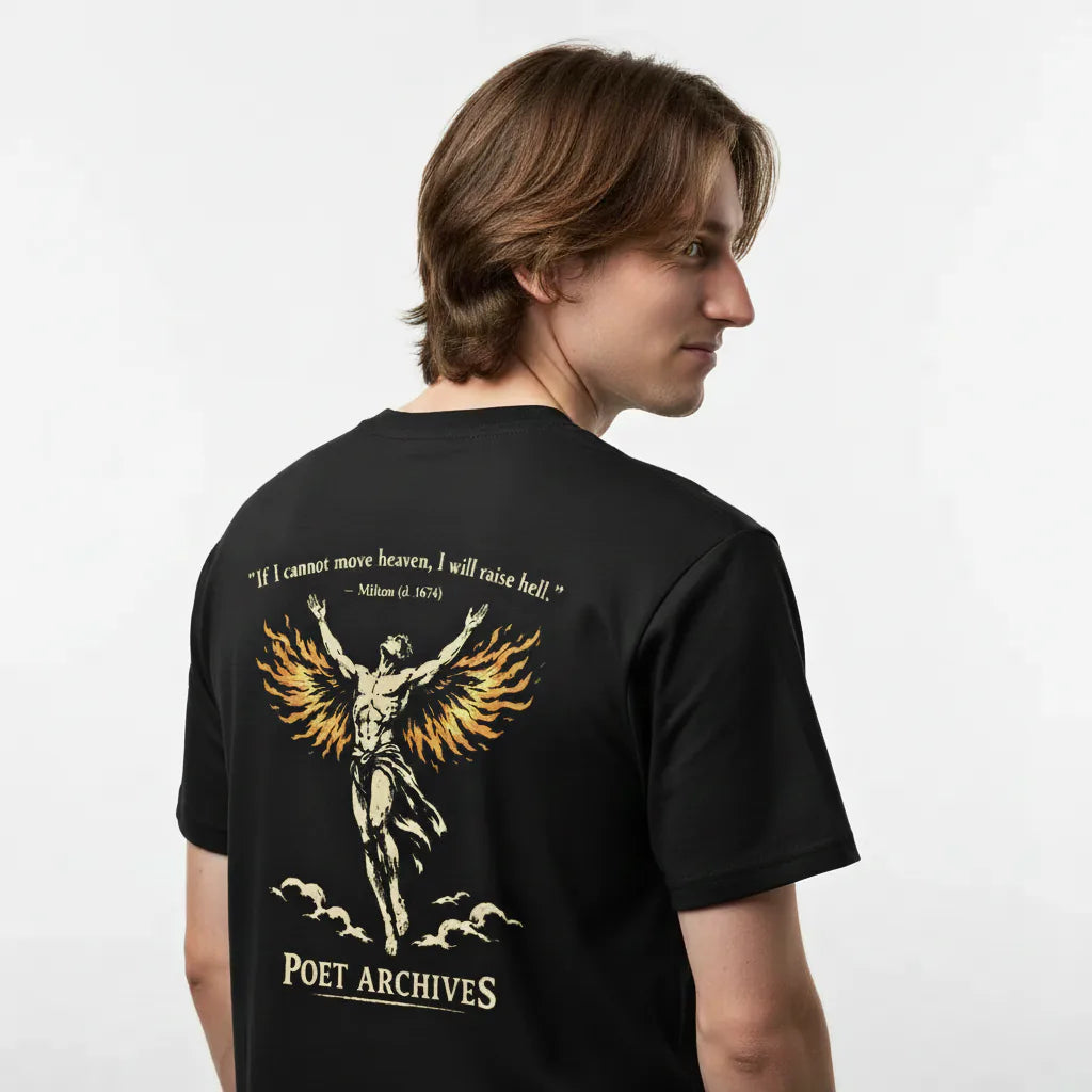 Person wearing a black t-shirt with a graphic design and text on the back, on a plain background