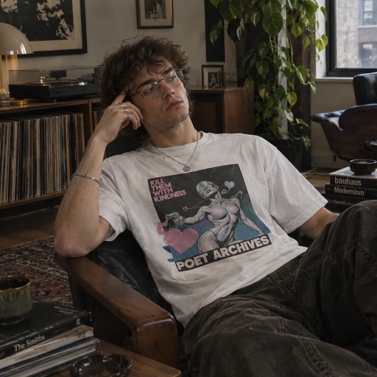 Kill Them With Kindness T-Shirt displayed at another angle, from Poet Archives
