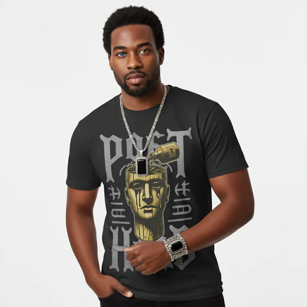 Man wearing a black t-shirt with graphic design and jewelry on a white background