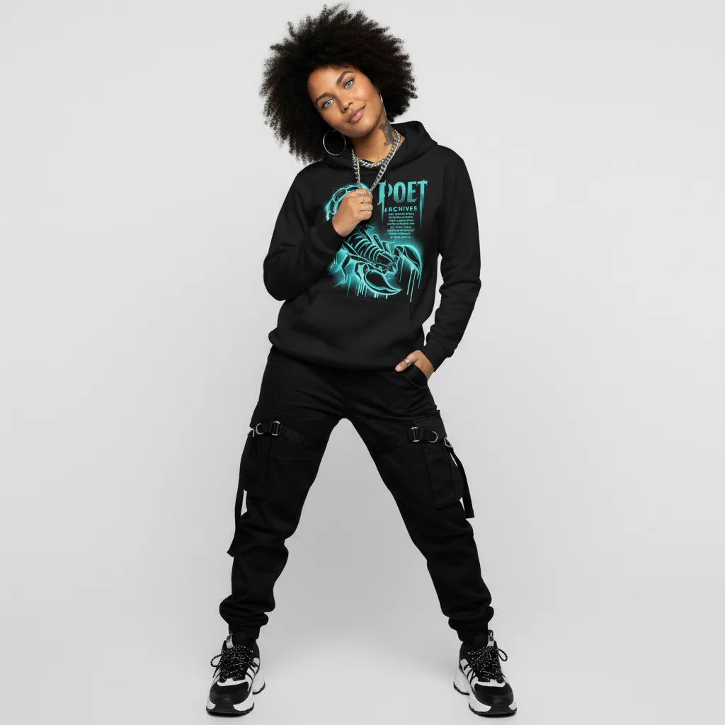 Person wearing a black hoodie with a graphic design on a plain background