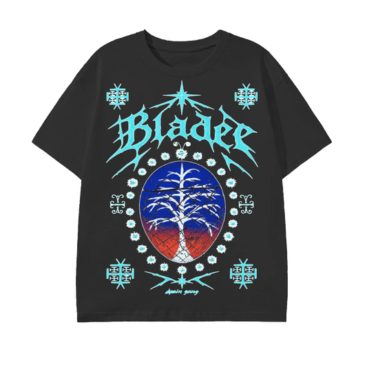 A black short-sleeve graphic t-shirt featuring a large front print with the word 'Bladee' in stylized light blue lettering, a central circular tree design in blue and red, and decorative light blue motifs on a plain white background.