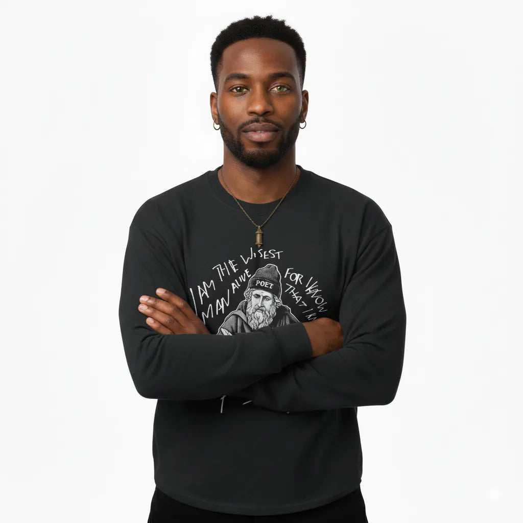 Man wearing a black sweatshirt with graphic design and text on a white background